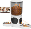 Pet feeder dispensing food with a smartphone app interface showing two pets.