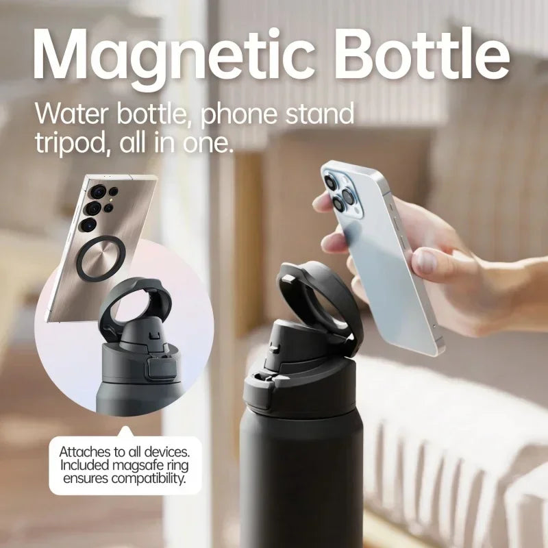 Black magnetic bottle with phone stand and tripod functions, used as a phone stand.