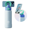 Blue water bottle with green accents and phone holder on a white background