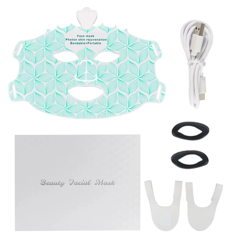 Facial mask set with geometric design, USB cable, and accessories on a white background