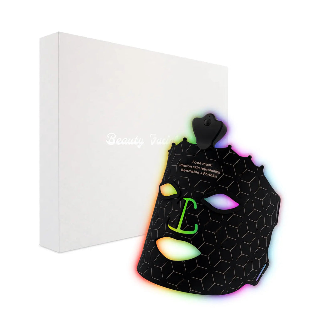 Black face mask with colorful hexagonal patterns on a white background